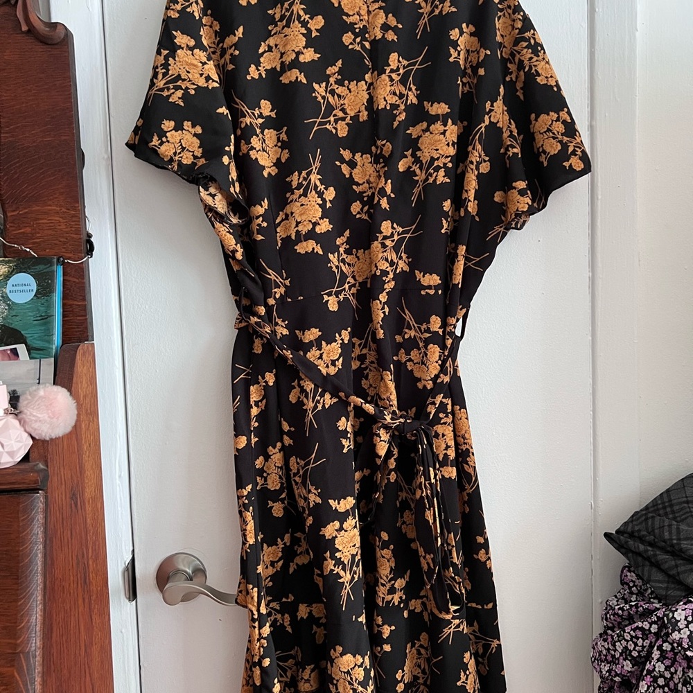 Flattering gold and black dress.